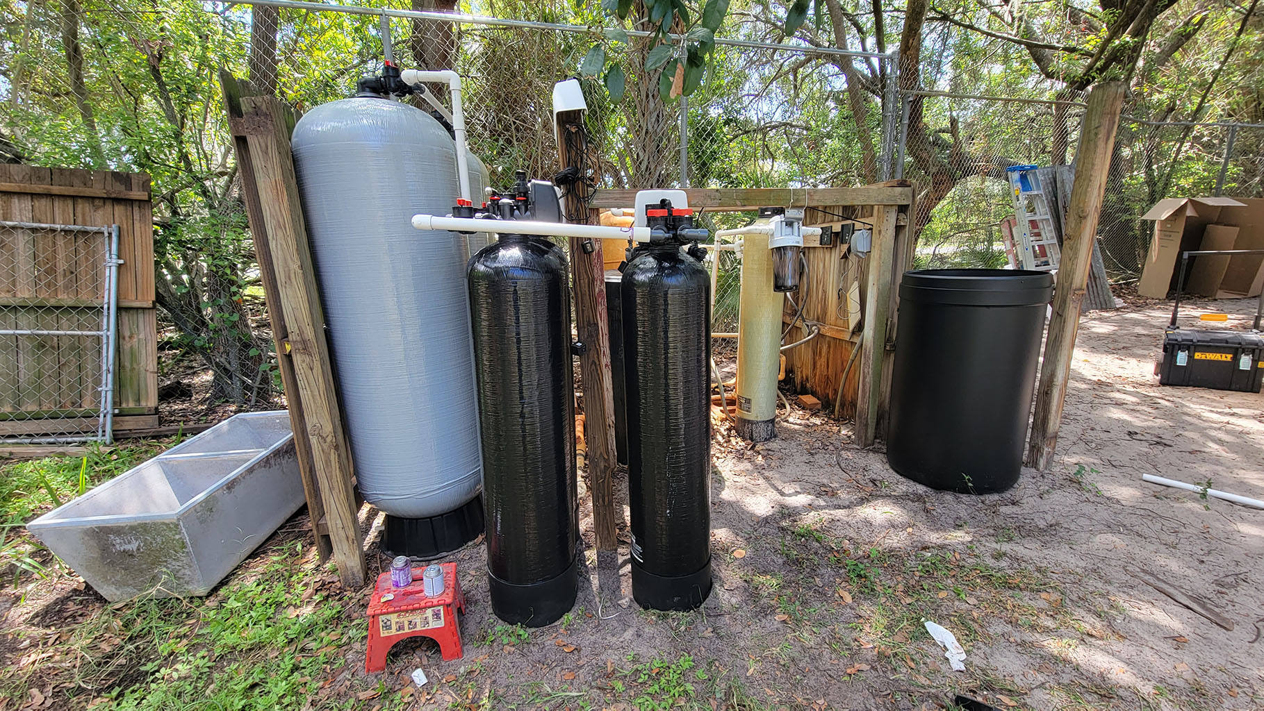 Commercial well water treatment system installation in Naples business facility