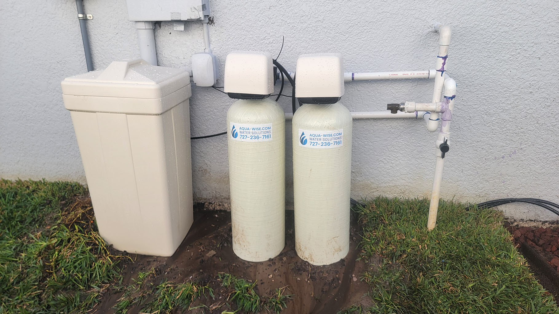 AQUALUX WellFusion well water treatment system installed in a rural setting in Venice
