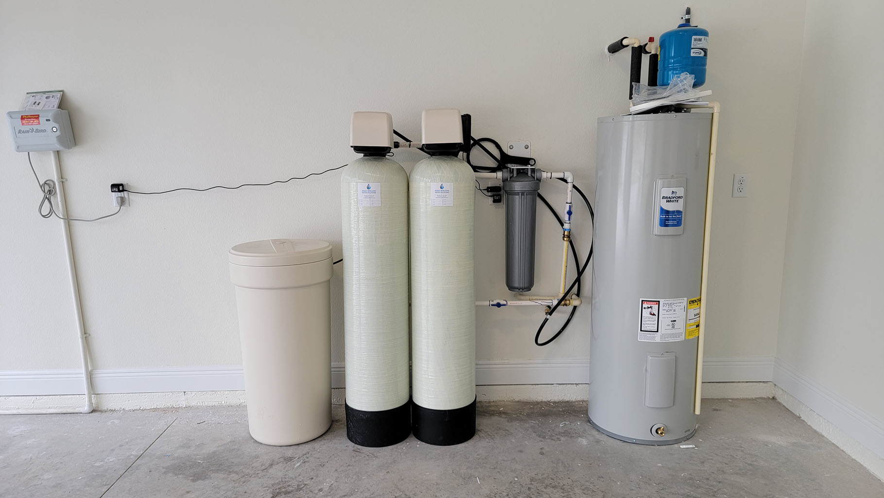 Commercial well water treatment system installation in Naples