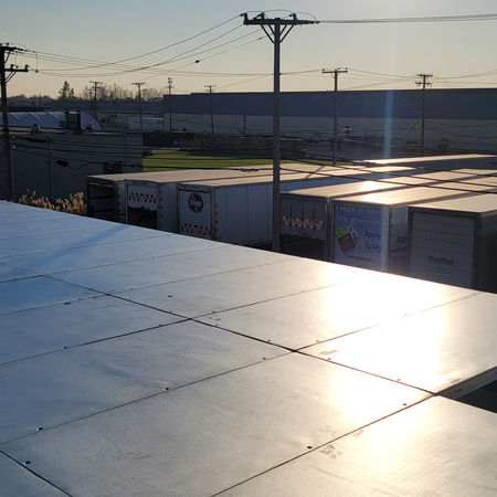 installing an outdoor insulated panel ceiling for a refrigerated warehouse
