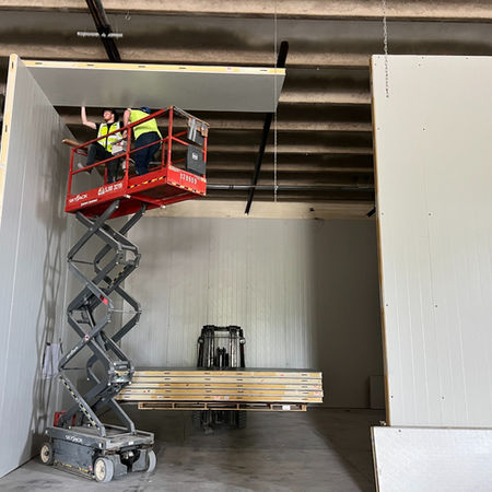 installing and locking insulated ceiling panels