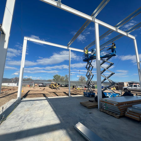 installing a metal building frame