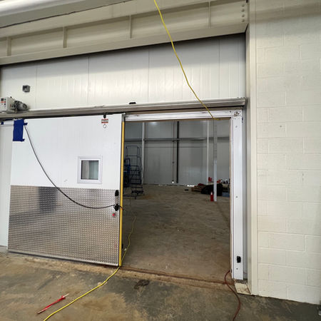 electric single-leaf insulated panel sliding door