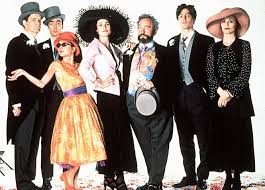 Movie poster of Four Weddings and A Funeral showing the main cast