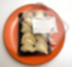 Vareniky con repollo y tocino. Ravioles rusus congelado - en caja para vender