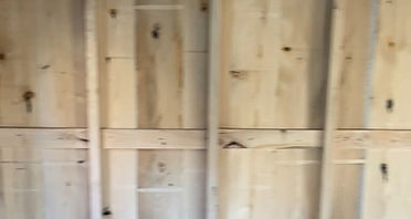 Interior view of the beautiful Hemlock walls and Amish framing