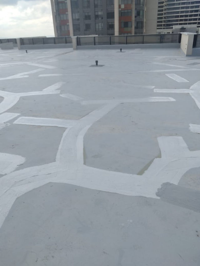 Flat Roof Crack Repair and Maintenance In Progress By Nsimeko Projects.