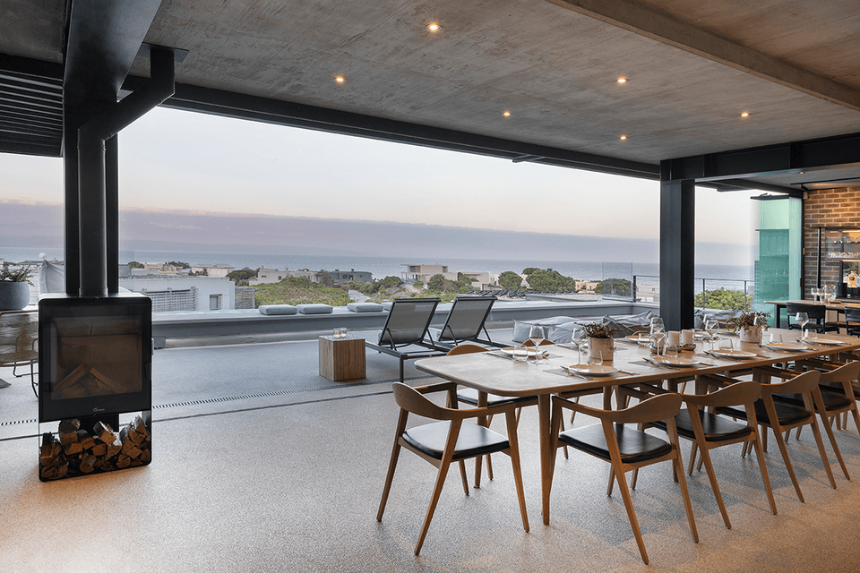 This contemporary home was designed to enjoy 180 degrees of ocean view