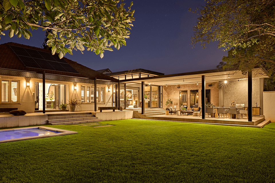 Family home renovation with industrial architectural extensions