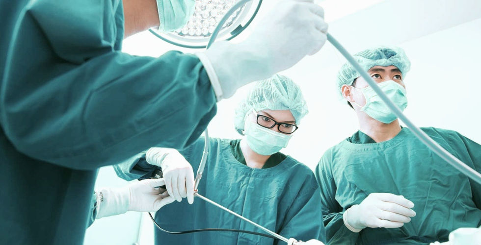 Orthopedic surgeon in Mexico performing minimally invasive spine surgery for uninsured patients