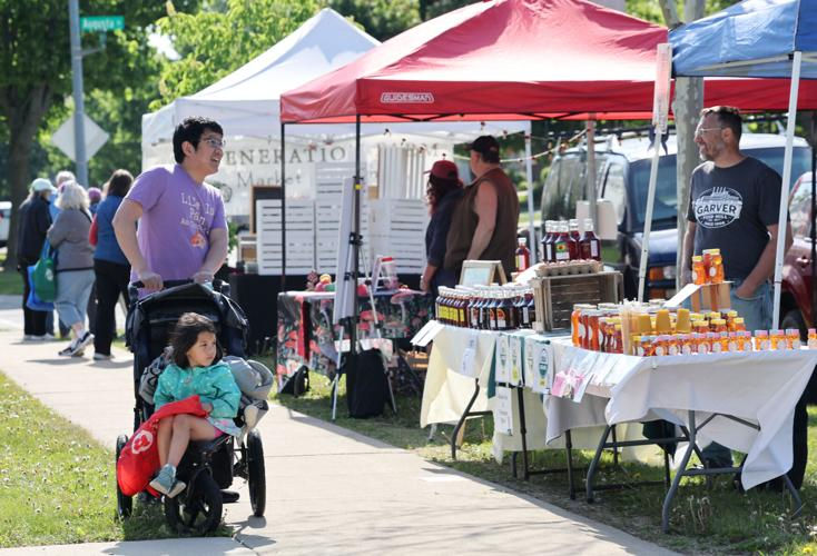 People shopping at a farmers market