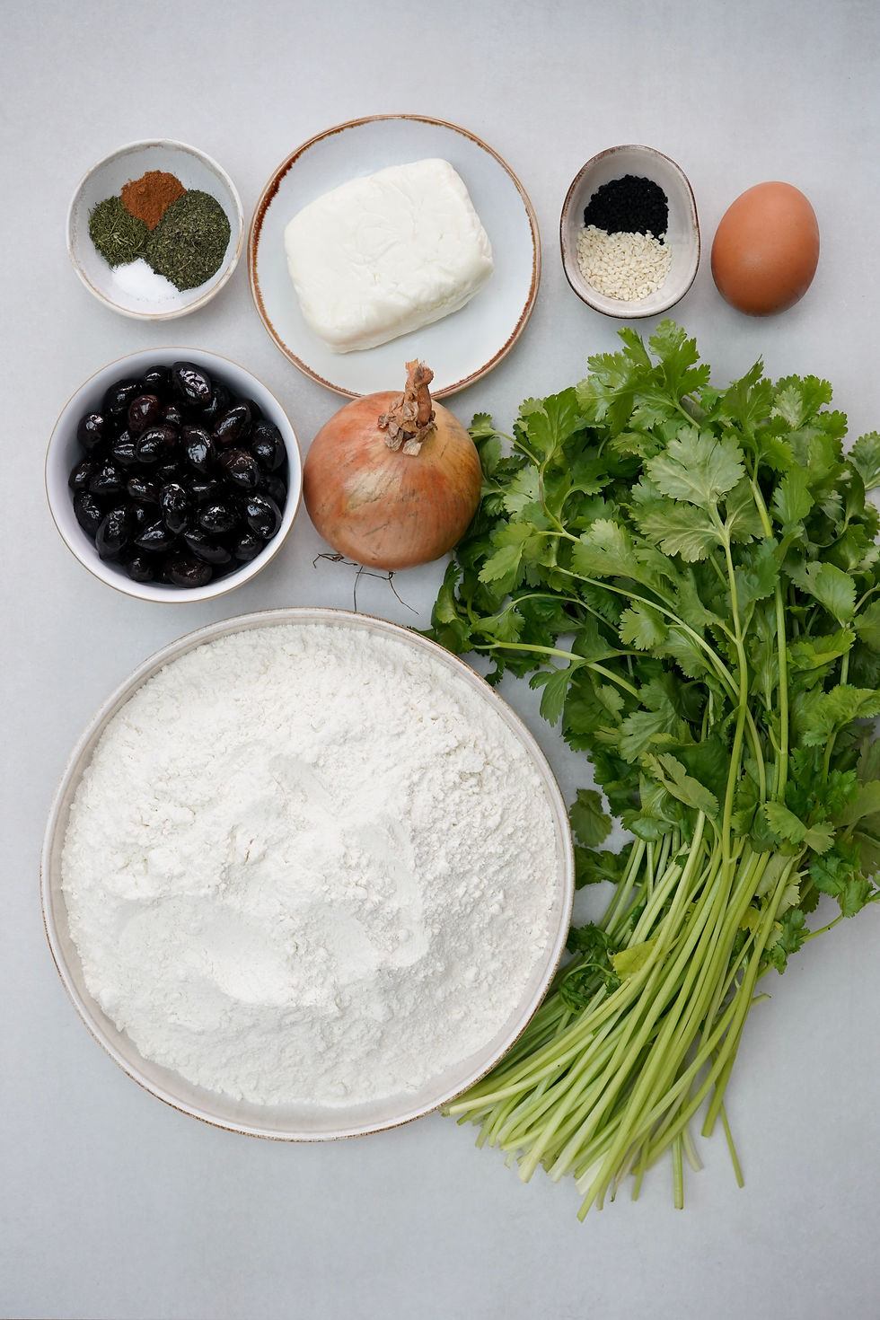 Zeytinli hellimli kek ingredients on a kitchen worktop