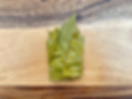 Vine leaf folded from left and right like an envelope around the yalancı dolma filling