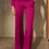 Thumbnail: Woman in fuchsia wide-leg pants