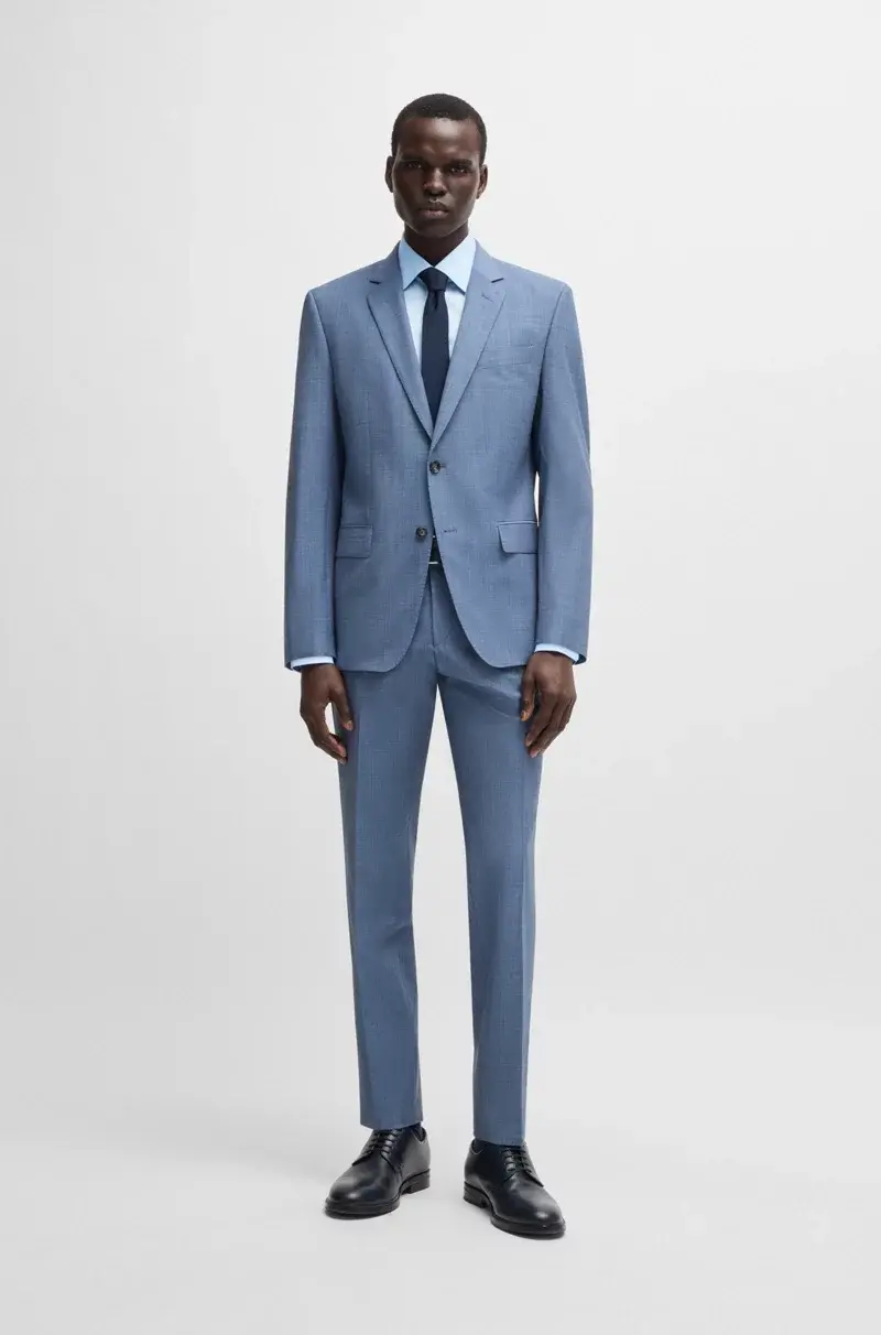 Man in light blue suit