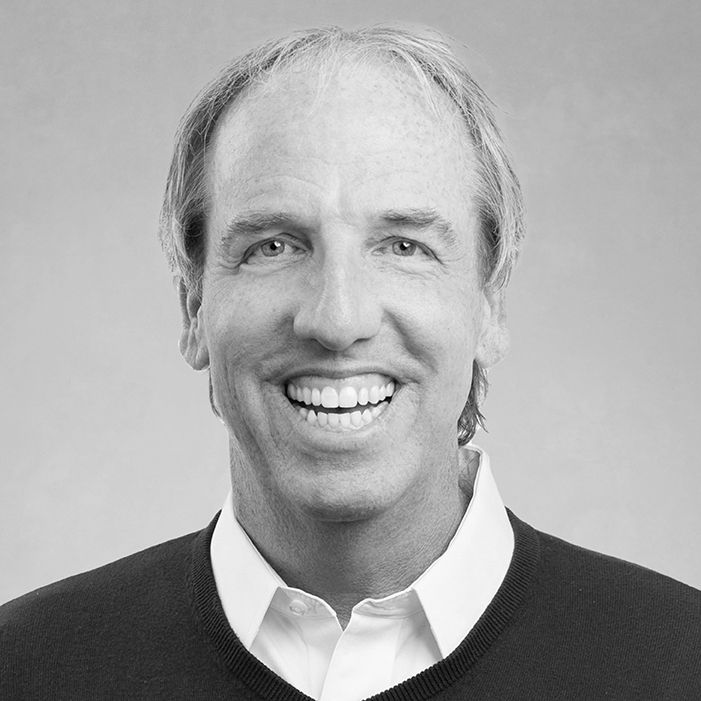 Portrait of a smiling man with a collared shirt