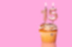 Birthday Cake With Candle Number 15 - On Pink Background.jpg