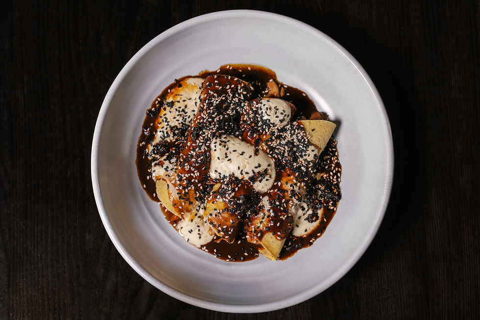 Libres Chicken Mole Enmoladas is a traditional Mole Poblano featuring Cashew Nuts, Sesame Seeds and a range for dried fruits, warming spices, toasted chilli and bitter chocolate