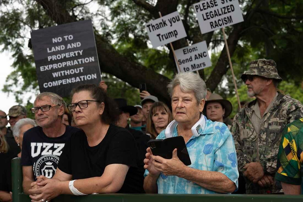 White Afrikaaner South Africans demonstrate in support of U.S. President Donald Trump in front of the U.S. embassy in Pretoria, South Africa, Feb. 15.