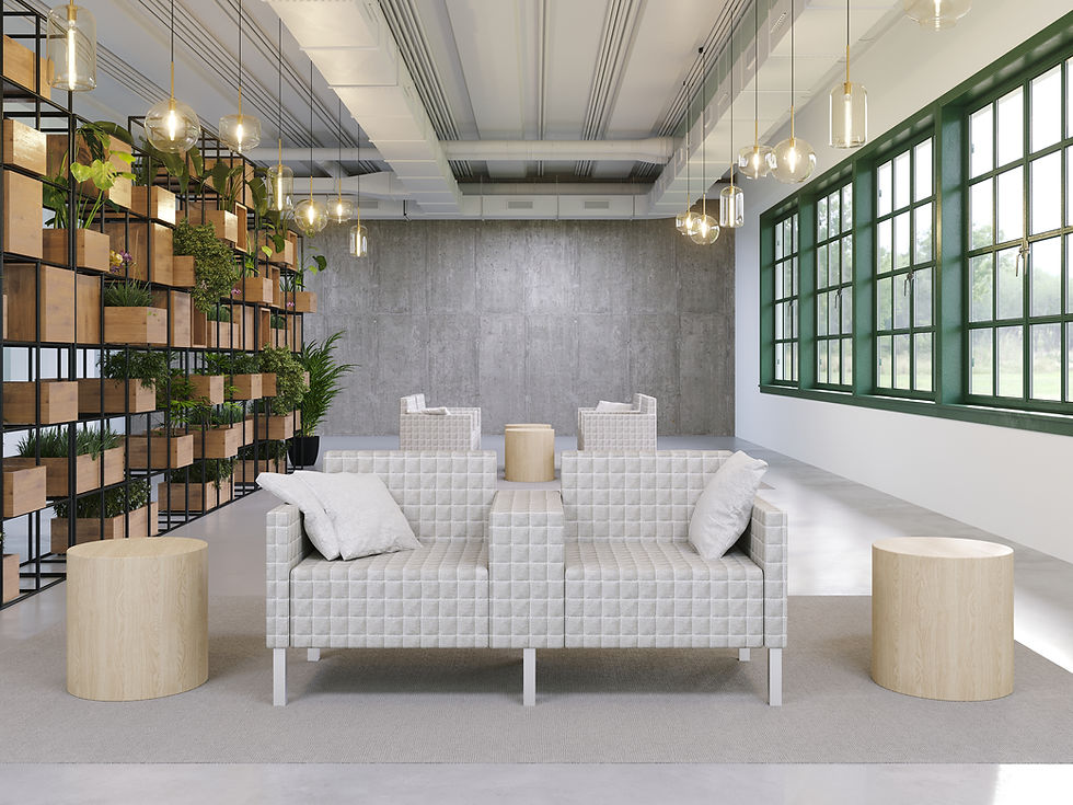 Modern office lounge featuring Thk+Thn tandem sofa with quilted upholstery, light wood side tables, hanging pendant lights, indoor plants, and large green-trimmed windows providing natural light.
