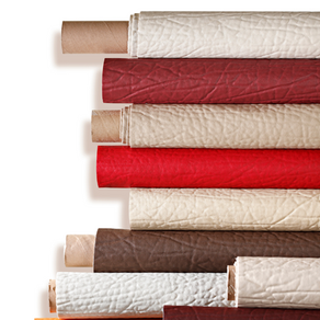 Rolls of coated upholstery lined up