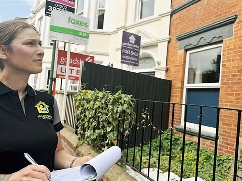 Karolina Wiercinska, surveyor at Yellow Brick Surveyors, recording observations on site