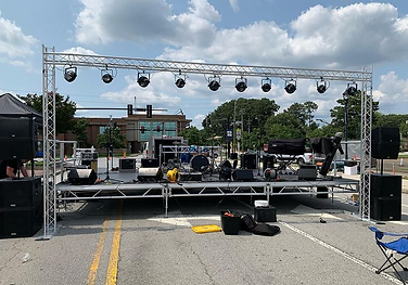 a group of speakers and equipment with our stage setup