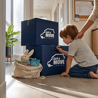 Child writing on Let's Move moving boxes near a toy bag.