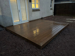 New wooden deck outside a house