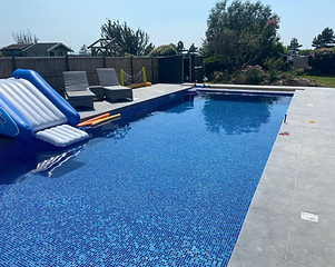 Outside swimming pool with slide