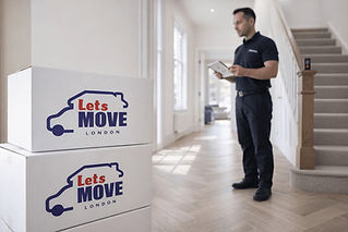 Mover checking inventory near Lets Move London boxes