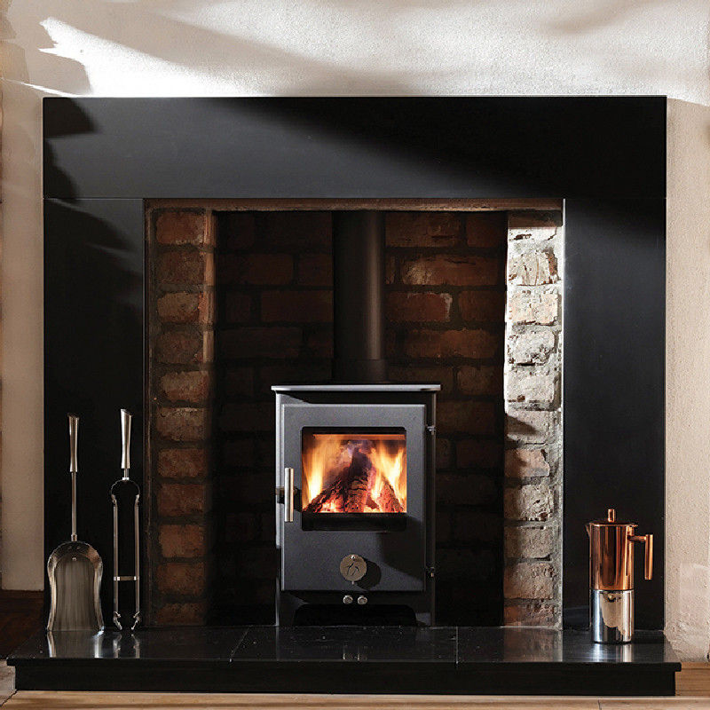 Chilli Penguin 5kW Short Penguin multi fuel stove in a brick fireplace
