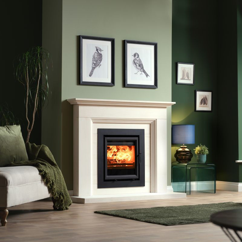 Fireline Ecostar 5 Wide Inset Stove in a white fireplace
