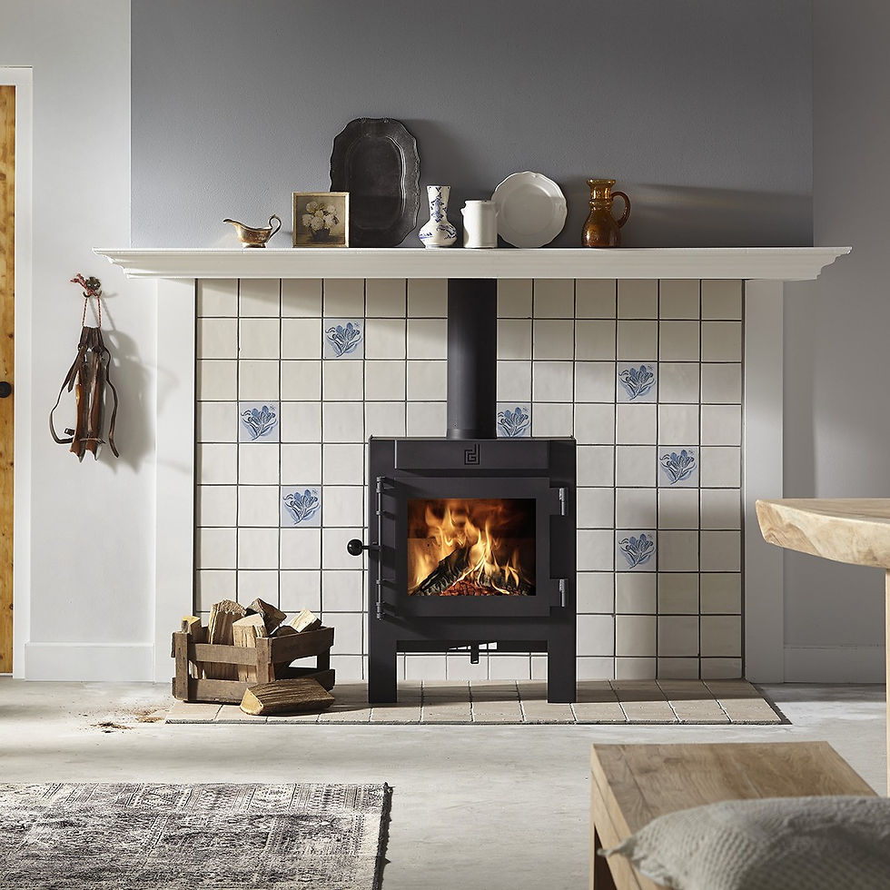 Dik Geurts Jannik Large wood burning stove in a tiled hearth