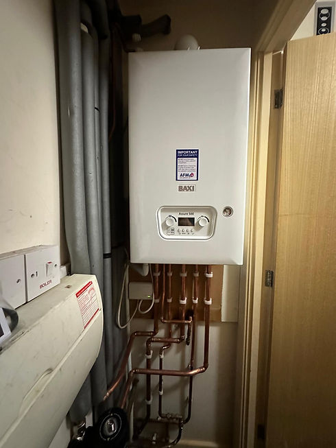 Wall-mounted Worcester Bosch boiler with copper piping