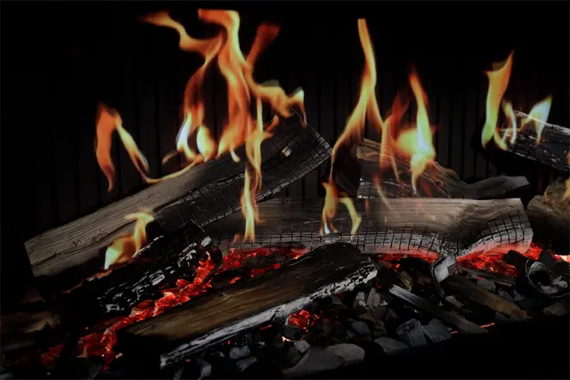 Close-up of realistic log fire in a Virtuo 130 stove