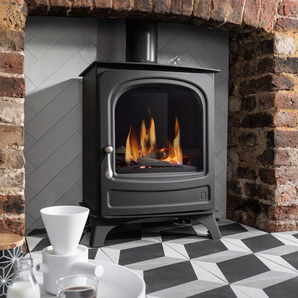 Ex display Holborn LPG gas stove with lit flames inside.