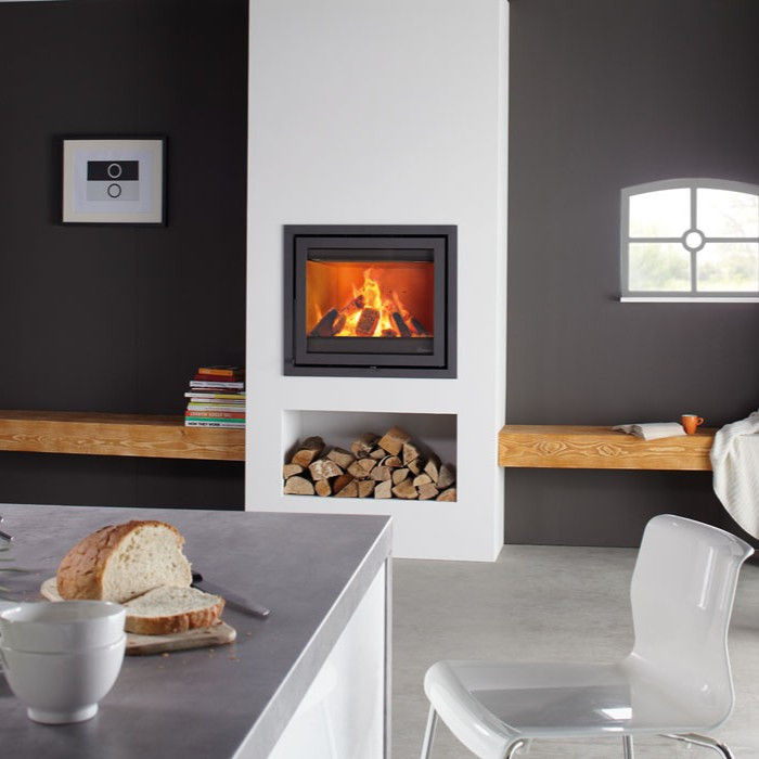 Dik Geurts Instyle 700 Front inset wood burning stove in a modern living room