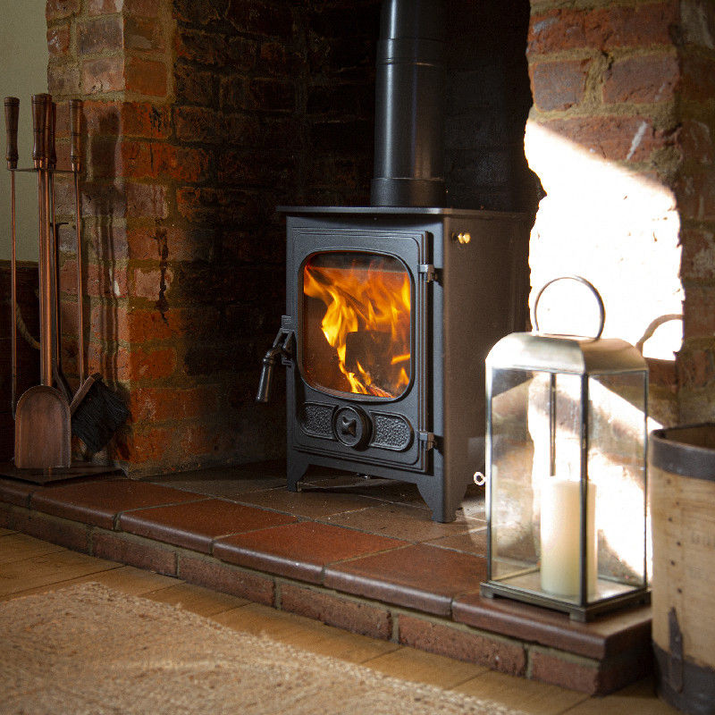 Charnwood Country 4 woodburning stove in brick fireplace