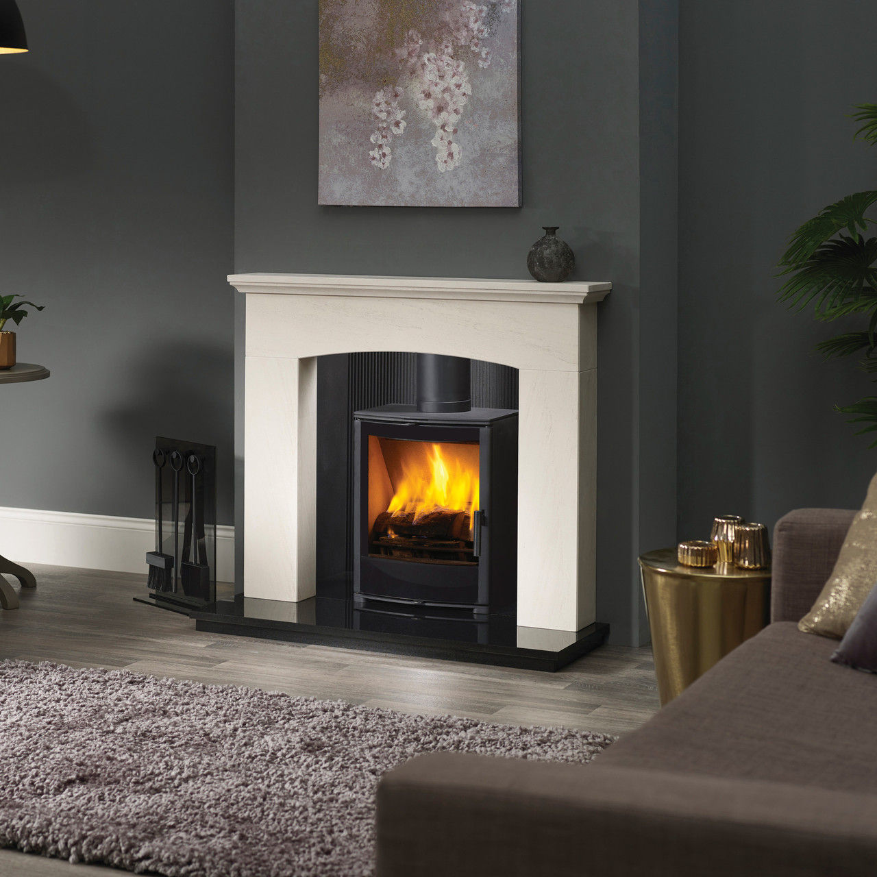 Capital The Panamera Eco 4.9kW woodburning stove in a fireplace