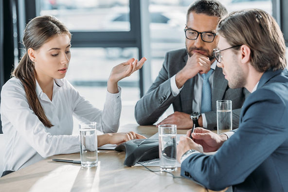 Woman explaining her case during mediation services session.