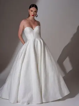 Woman in white strapless full-skirted gown