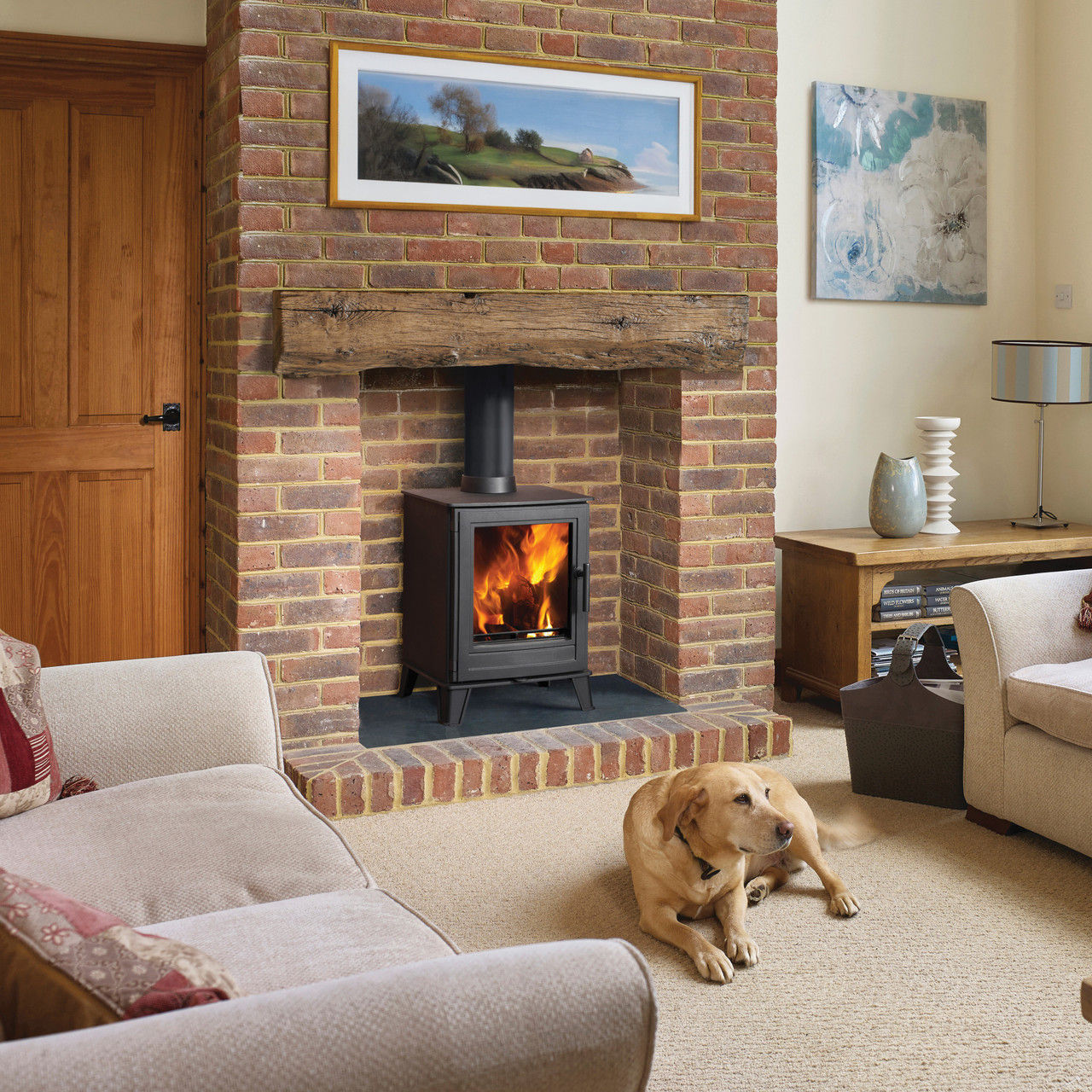 Capital RIDGMONT 5kW ECO Woodburning Stove in brick fireplace