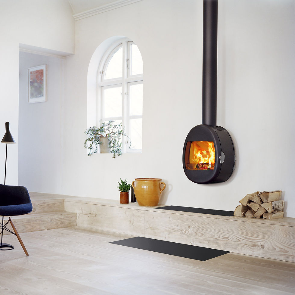 Scan 66-1 5kW wall-mounted wood burning stove in a room.