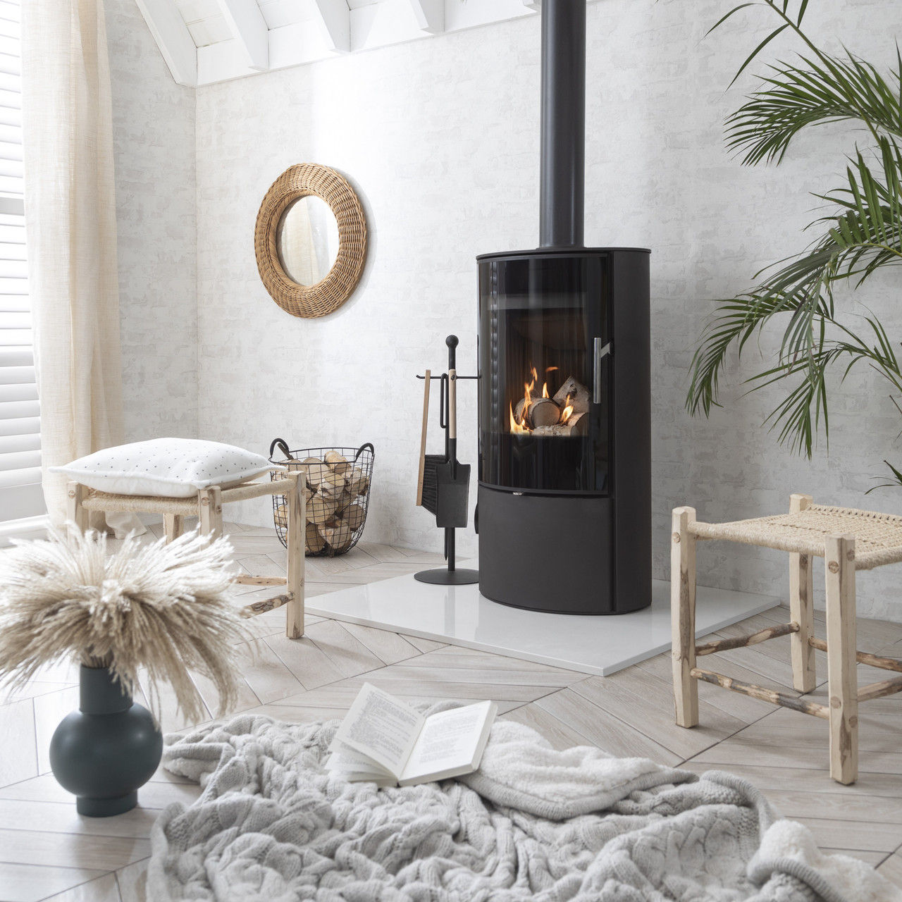 Arada Lagom 4 Steel 4kW Wood Burning Stove in a living room