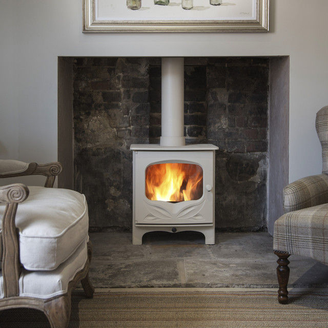 Charnwood Bembridge woodburning stove in a fireplace.