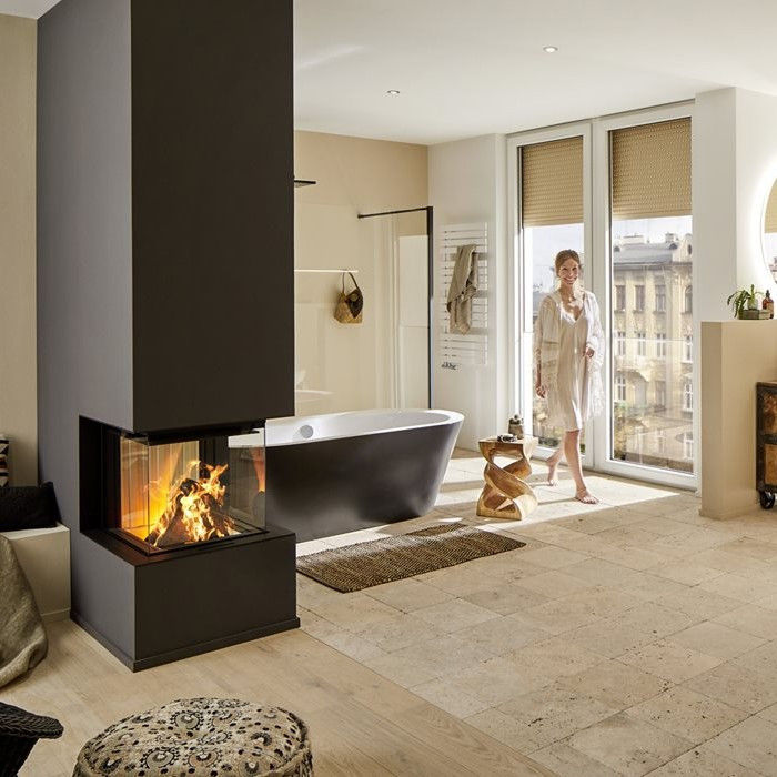 Spartherm Premium Triple wood burning insert in a bathroom