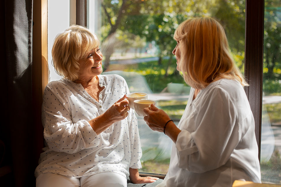 medium-shot-women-holding-coffee-cups.jpg