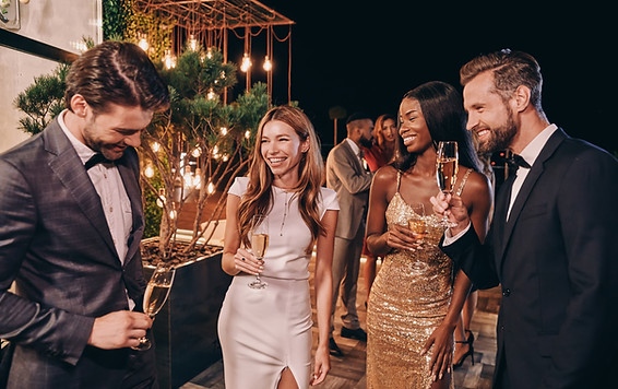 Social mixer for singles, people laugh and drink together in formal attire