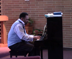 Snapshot Piano John.png